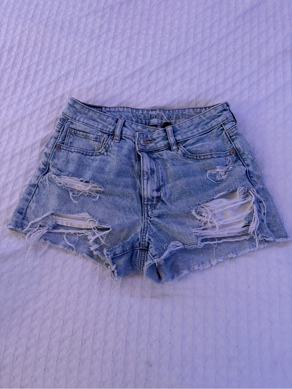 American Eagle Crossover Waist Light Wash Distressed Denim Shorts
